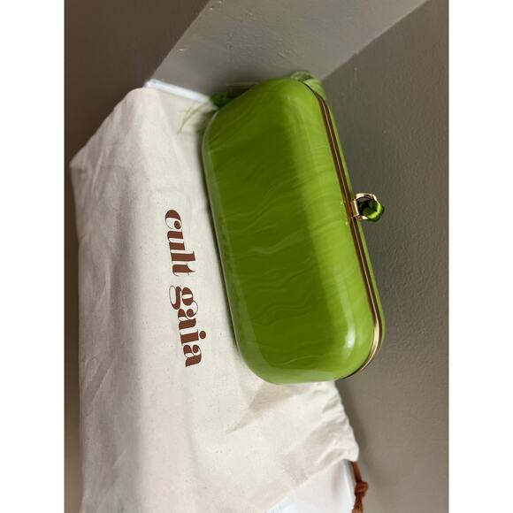 Cult Gaia
small Yasmin tassel-embellished clutch bag - Picture 9 of 10